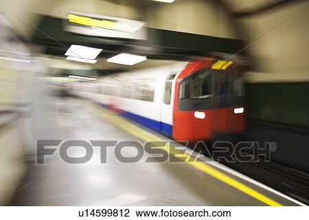 Stock Image - Blurred, Commute, Departing, Indoors. Fotosearch