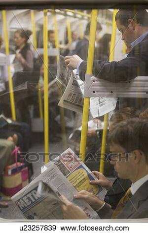 Stock Photo - Commuters, Conveyance, Crowd, Indoors, Large Group Of People. Fotosearch