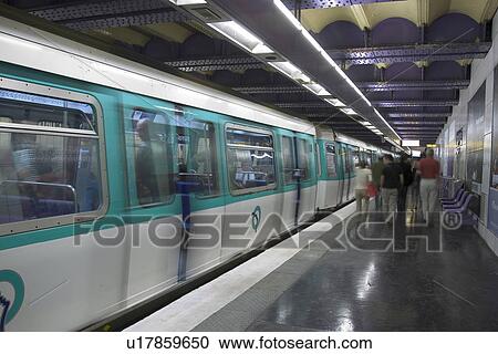 Stock Image - travel, commute, commuting, commuter, locomotive, station. Fotosearch