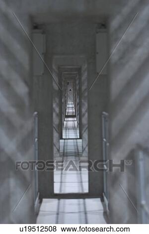 Stock Photo - wall, shadows, house, enclosed, path, subway. Fotosearch