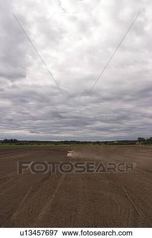 Stock Photo - Car, Farm, Day, Clouds, Agriculture. Fotosearch