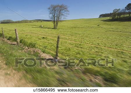 Stock Photography - barbed wire fence, climate, condition. Fotosearch