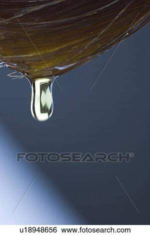 Stock Photograph - Background, Blue, Close-Up, Dripping, Drop. Fotosearch