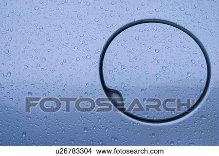 Picture - car, vehicle, headlights, automobile, raindrops, drops. Fotosearch