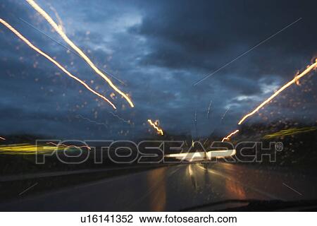 Stock Image - Close-Up, Clouds, Dark, Glow. Fotosearch