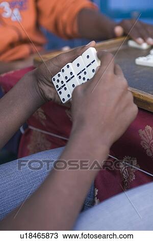 Stock Image - Casual Clothing, Gamble, Domino, Close-Up, Adults Only. Fotosearch