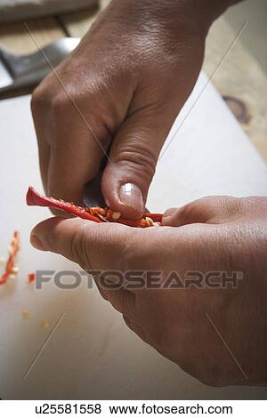 Stock Photo - Close-Up, Cutting, Details, Food, Holding. Fotosearch