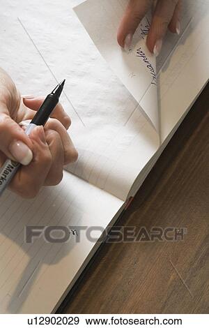 Stock Photo - Close-Up, Diary, Holding. Fotosearch
