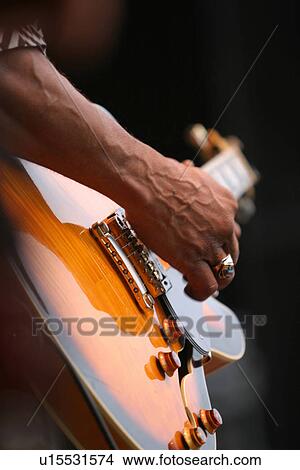 guitar, guitarist, close-up, fingers, strumming, playing View Large Photo Image Picture - guitar, guitarist, close-up, fingers, strumming, playing. Fotosearch