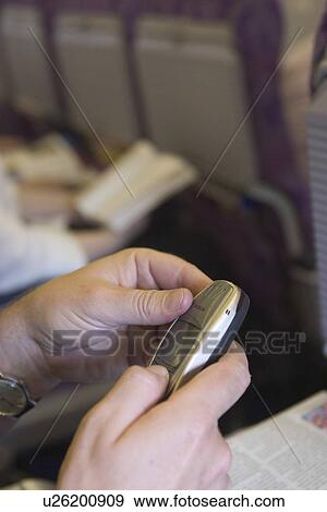 Stock Photo - one person, device. Fotosearch