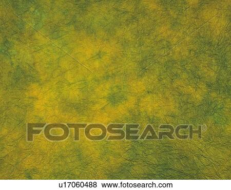Stock Photo - Japanese paper colored green and yellow, close up. Fotosearch