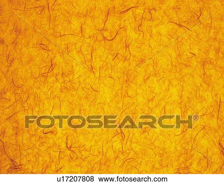 Stock Photo - Japanese paper colored orange, close up. Fotosearch