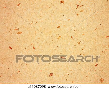 Stock Photo - Japanese paper colored orange with spots, close up. Fotosearch
