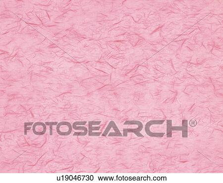 Stock Image - Japanese paper colored pink, close up. Fotosearch