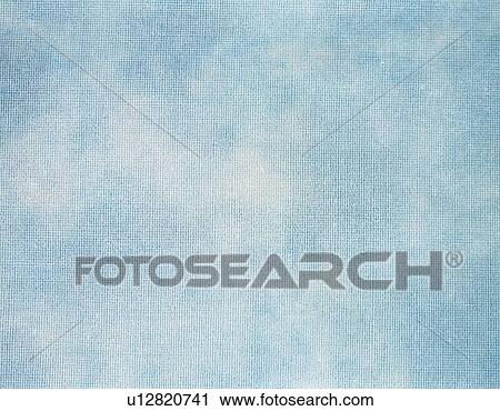 Stock Image - Japanese paper in blue and white marble pattern, close up. Fotosearch