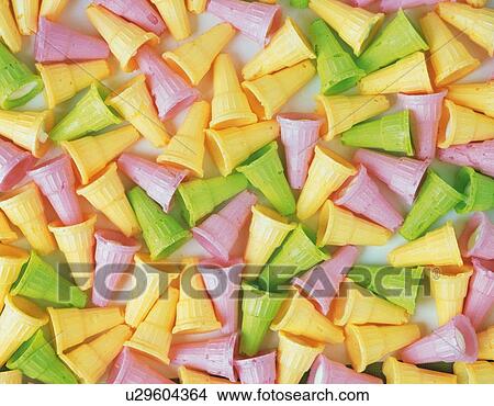 Picture - Mass of colored ice cream cones . Fotosearch