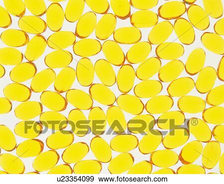 Mass of vitamin capsules View Large Photo Image Stock Photo - Mass of vitamin capsules. Fotosearch