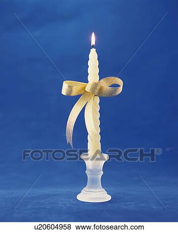 Burning Candle Wrapped By Ribbon, Front View, View Large Photo Image Stock Photo - Burning Candle Wrapped By Ribbon, Front View, . Fotosearch