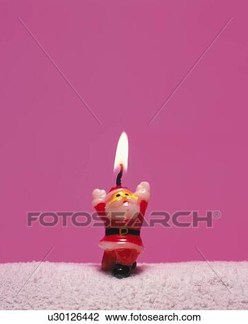 Stock Image - Candle of Santa Claus, Front View, Close Up, Copy Space. Fotosearch