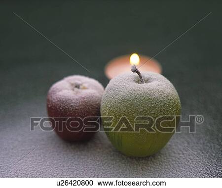 Stock Image - Candles of Apple, Close Up, High Angle View, Differential Focus, In Focus, Out Focus. Fotosearch
