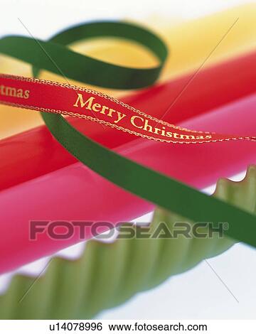 Stock Photograph - Colorful Candles and Ribbon, Close Up, Differential Focus, In Focus, Out Focus. Fotosearch