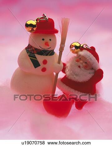 Stock Photo - Ornament of Santa Claus and Snow Man, High Angle View, Close Up. Fotosearch