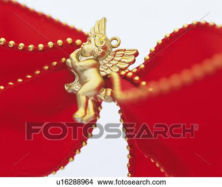 Red Ribbon with Gold Angel, Close Up, Differential Focus, In Focus, Out Focus View Large Photo Image Picture - Red Ribbon with Gold Angel, Close Up, Differential Focus, In Focus, Out Focus. Fotosearch