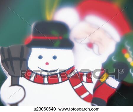 Stock Image - Santa Claus and Snow Man, Close Up, Front View, Soft Focus. Fotosearch