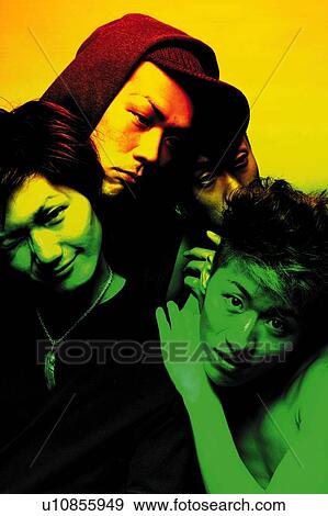 Stock Photo - Three Young Adult Men Posing, Photography, Front View, Toned Image. Fotosearch
