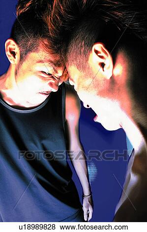 Two Young Adult Men Fighting, Photography, Side View, Rear View View Large Photo Image Stock Photo - Two Young Adult Men Fighting, Photography, Side View, Rear View. Fotosearch