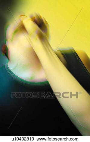 Stock Photo - Young Adult Man being Punched, Photography, CG, Low Angle View, Blurred Motion, Toned Image. Fotosearch