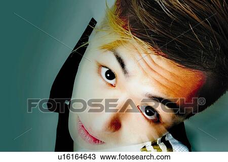 Stock Image - Young Adult Man Looking Up, Photography, CG, High Angle View, Close Up. Fotosearch