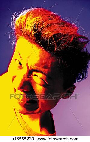 Stock Image - Young Adult Man Looking Up, Photography, High Angle View, Toned Image. Fotosearch