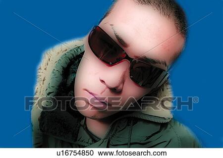 Stock Image - Young Adult Man Looking Up, Photography, CG, Composite, High Angle View, Close Up. Fotosearch