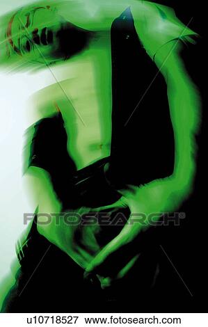 Stock Photo - Young Adult Man Posing, Photography, CG, Low Angle View, Toned Image. Fotosearch