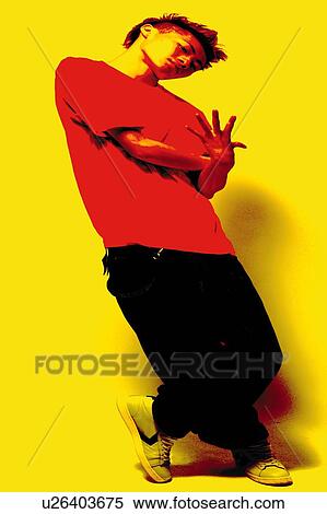 Stock Photography - Young Adult Man Posing, Photography, Side View, Toned Image. Fotosearch