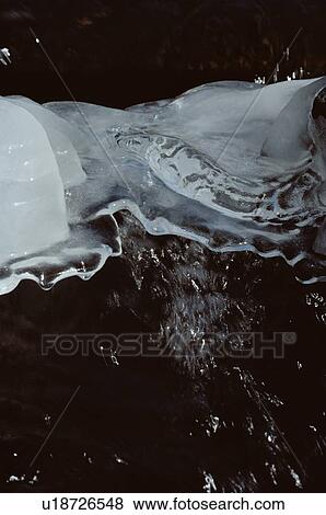 Stock Photo - Ice Formations Near Stream. Fotosearch