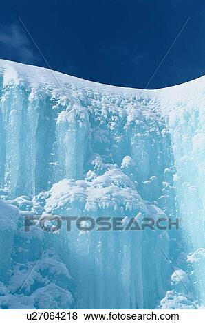 Stock Photo - Ice Wall Against Sky. Fotosearch
