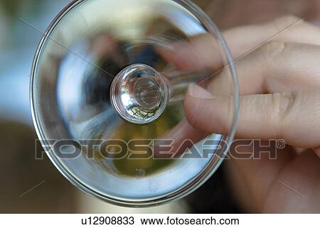 Stock Image - enjoyment, vine, wineglass, white wine, wine restaurant, hand, new wine. Fotosearch