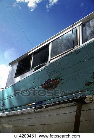 Stock Image - blue, boat, broken, CLOSE, close-up, damage, damaged. Fotosearch