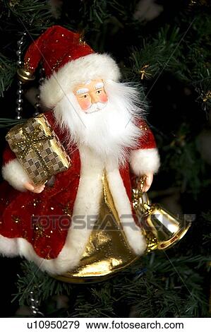 Stock Photo - Father Christmas, red, magic, gift, present, holidays. Fotosearch