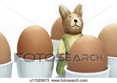 Stock Image - background, bowl, brown, decoration, ears, Easter, Easter bunny. Fotosearch