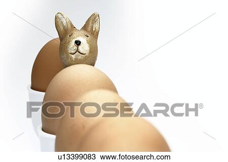Stock Image - background, bowl, brown, decoration, ears, Easter, Easter bunny. Fotosearch