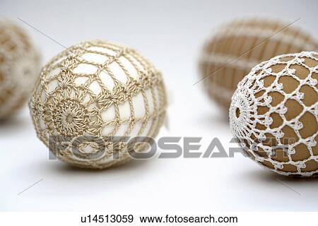 Stock Photo - brown, around-ticks, bowl, beige, background, decoration, amount. Fotosearch