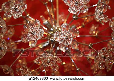Stock Image - background, crystal, crystal flower, cut-glass chandelier, detail, flower, flower lamp. Fotosearch