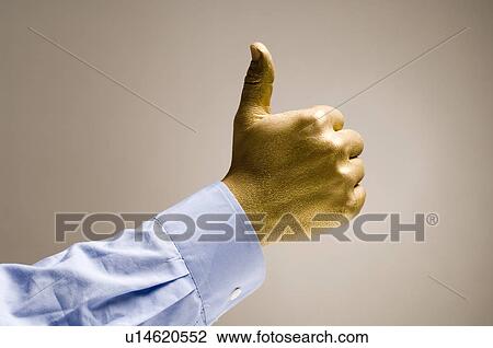 Stock Image - gilded, gilt, gold, golden, hand, goldy, human. Fotosearch