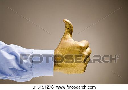 Stock Photo - gilded, gilt, gold, golden, hand, goldy, human. Fotosearch