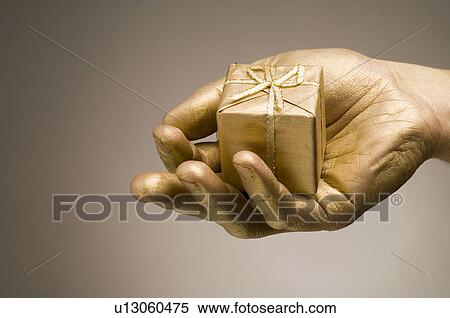gilded, gilt, gold, golden, hand, goldy, human View Large Photo Image Stock Photography - gilded, gilt, gold, golden, hand, goldy, human. Fotosearch