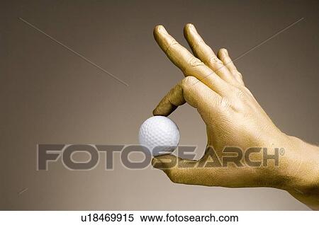 Stock Photography - gilded, gilt, gold, golden, hand, goldy, human. Fotosearch