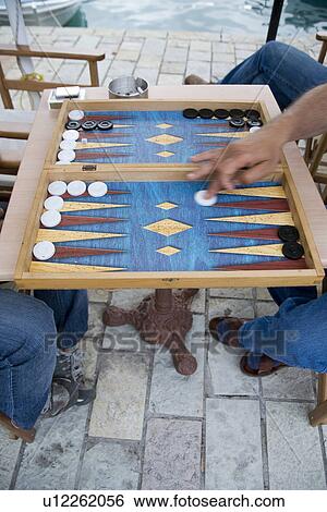 Stock Photograph - gewinn, backgammon, black, board game, competition, cube, deficit. Fotosearch